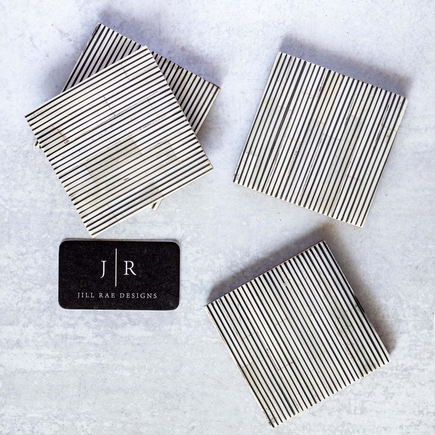BONE & HORN SET OF 4 CARVED LINED COASTERS